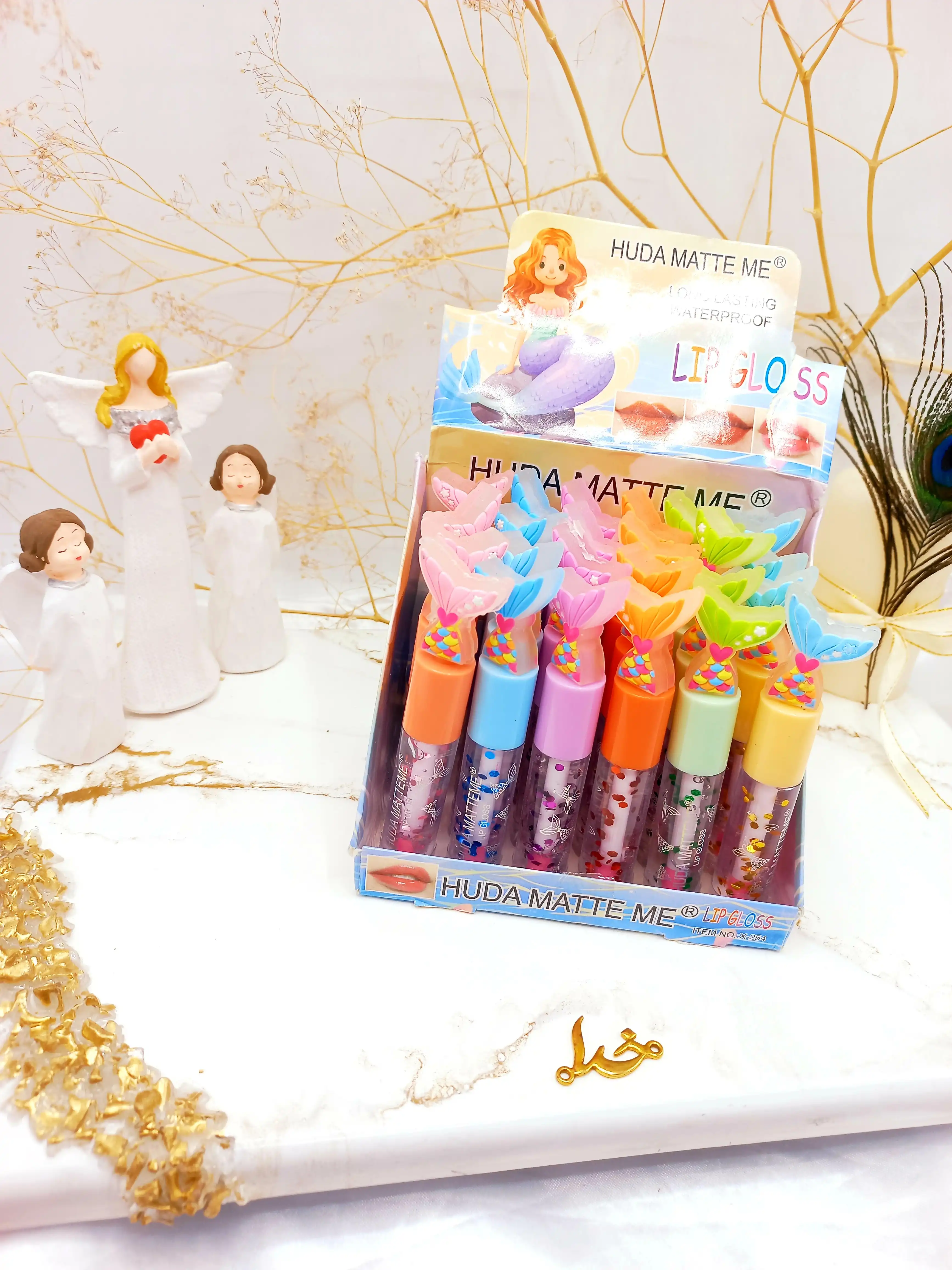 برق لب ویتامینه و حرارتی پری دریایی هدا مات می HUDA MATTE ME کد X254