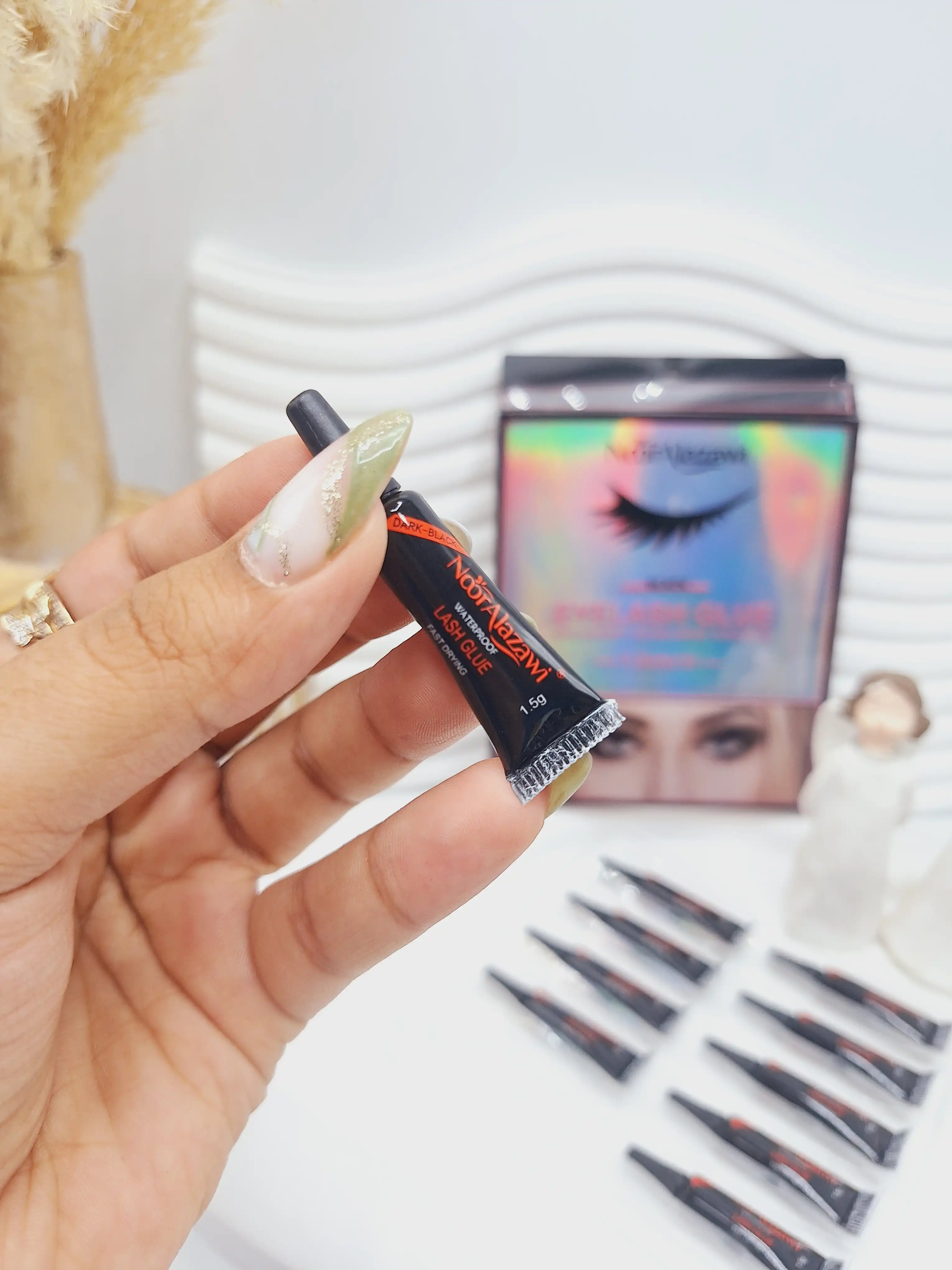 چسب مژه تکی برند Noor Alazawi حجم 1.5 گرم کد BX-3611 (کارتن مکعب)